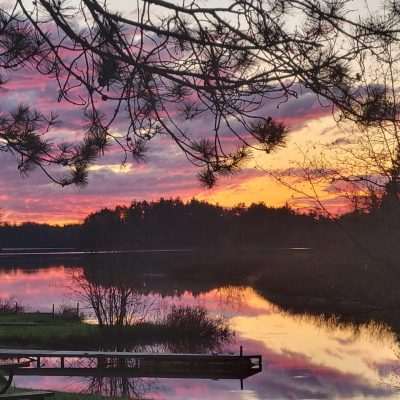 On Grand Portage Lake in the early Spring 2022 sunrise camping at the very nice Loon Lagoon Camp area in Mercer in Northern Wisconsin.