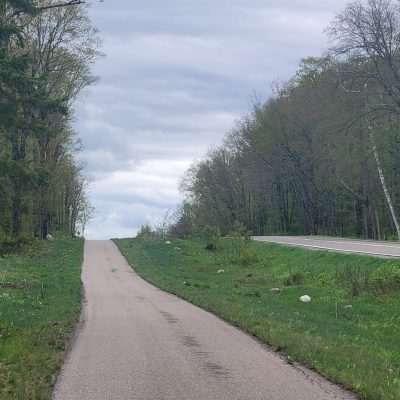 This is the bike trail along 424 in Iron County Michigan. Behind you is Caspian in the township of Stambaugh. Ahead in George Young Rec Area heading for Friday Fish Fry.