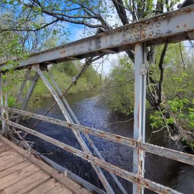 The old bridge on Pentoga Road National Forest Road 2446. Looking upriver the old Pentoga mill was very close to here. The Mill ruins are now on private property but back in the day I walked down and saw what little was left.