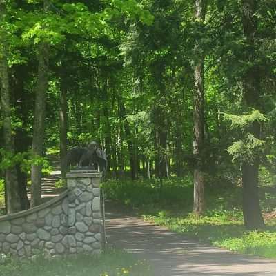 This private gate has always drawn my attention passing. Have always loved the sculptures and the long winding road.