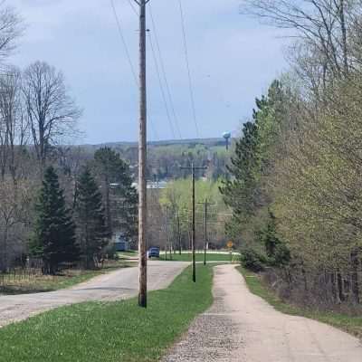 The Apple Blossom Trail leads you up Valley St in Gaastra MI up a nice climb and good view back to Caspian.