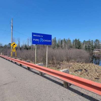 From Hwy 55 that would be the Brule River. You can float this river all the way to Old Pentoga Village.