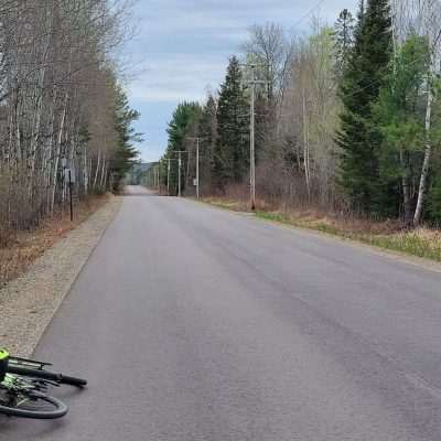 Taking a break on new black top on Kentucky Lake Road on my way to Eagle River from Pentoga.