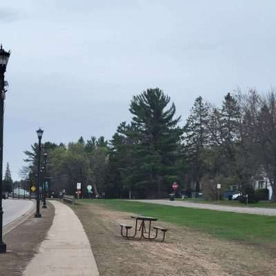 Eagle River water tower overlooking a verdant street scene