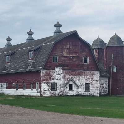 Loved the barn and the peaks and the old farm silos. Took this picture near Eagle River Wisconsin.