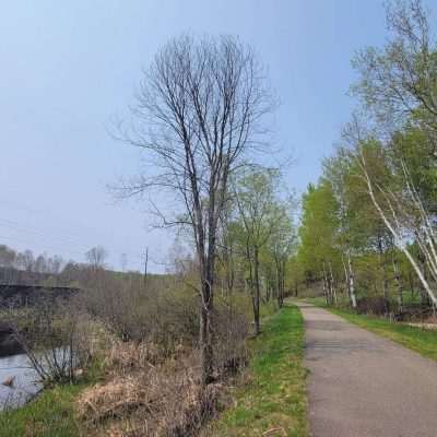 To the left is the old railroad that has been converted to the State Line Trail. To the South is Wisconsin and Brule River dividing Michigan's Upper Peninsula with Wisconsin. We are on the Apple Blossom trail leaving Caspian heading to Iron River.