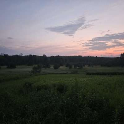 Peaceful sunset over rural landscape