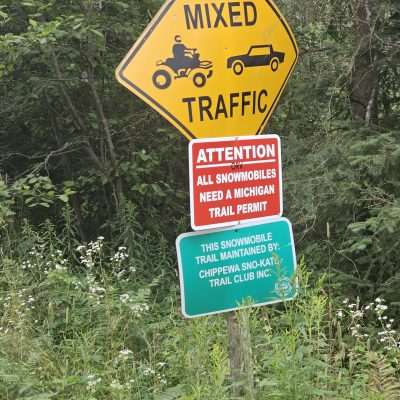 Mixed traffic and snowmobile permit sign