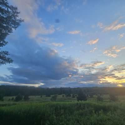 Sunset over lush green Pentoga Meadow -U.P. Michigan - Wisconsin