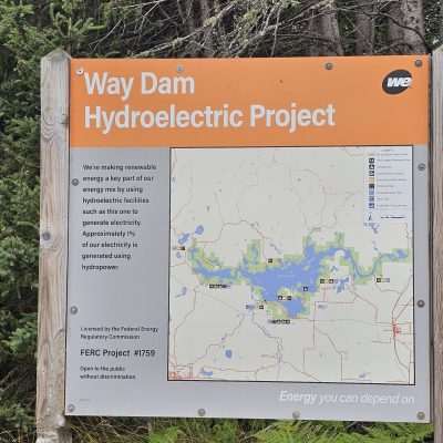 Way Dam Hydroelectric Project sign and map.