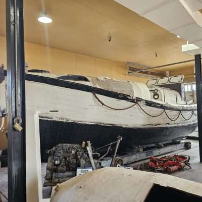 Vintage Lake Superior Rescue Boat Old wooden boat on display.