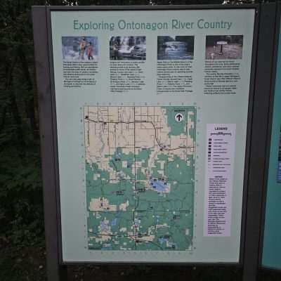 Sign at Bond Falls: Exploring Ontonagon River Country map and info.