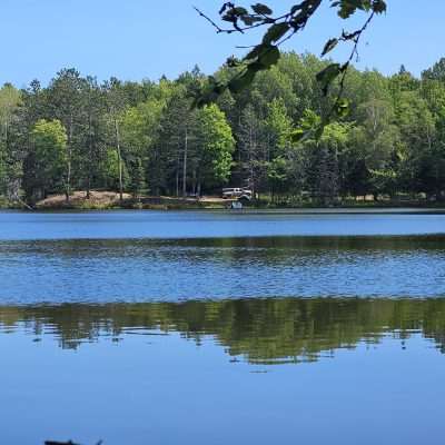 From a hike across the lake the view of out camp at Camp Three Lake.